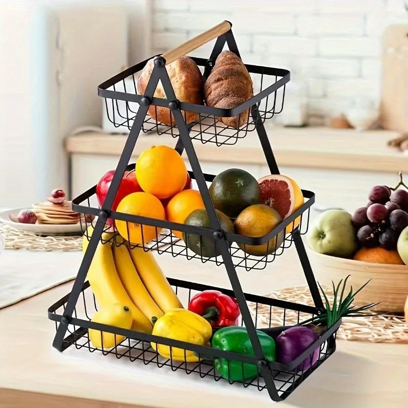 Three-tier fruit basket with sturdy kitchen storage box, suitable for fresh produce and household kitchen use.
