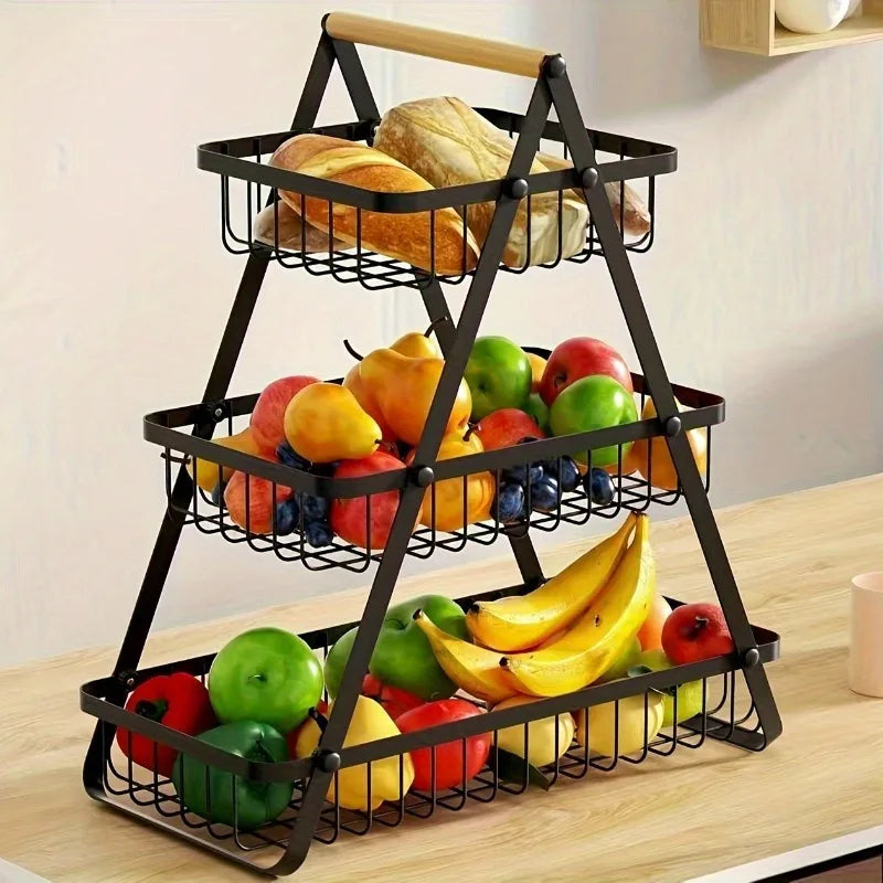 Three-tier fruit basket with sturdy kitchen storage box, suitable for fresh produce and household kitchen use.